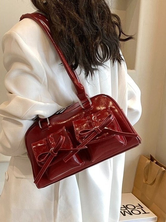 Fashion women's bag new style niche baguette bag handbag shoulder messenger bag bow hot girl armpit bag eprolo