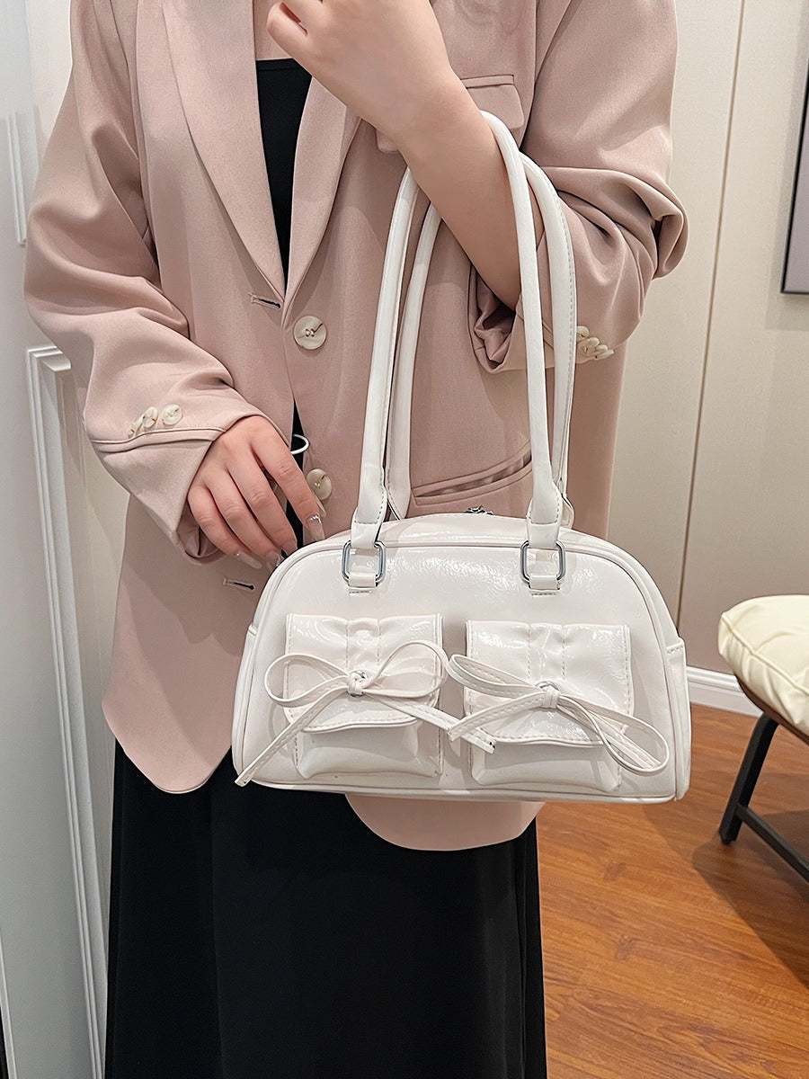 Fashion women's bag new style niche baguette bag handbag shoulder messenger bag bow hot girl armpit bag eprolo