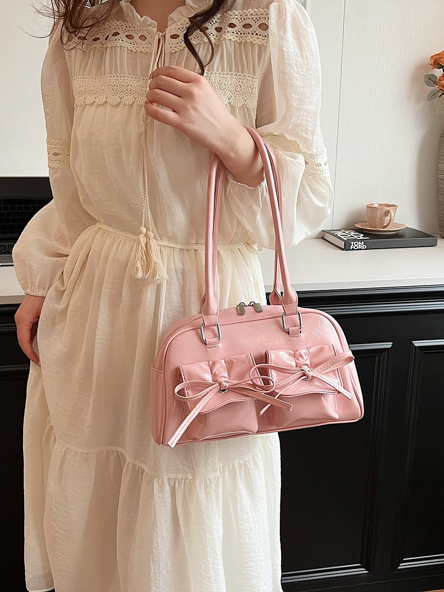 Fashion women's bag new style niche baguette bag handbag shoulder messenger bag bow hot girl armpit bag eprolo