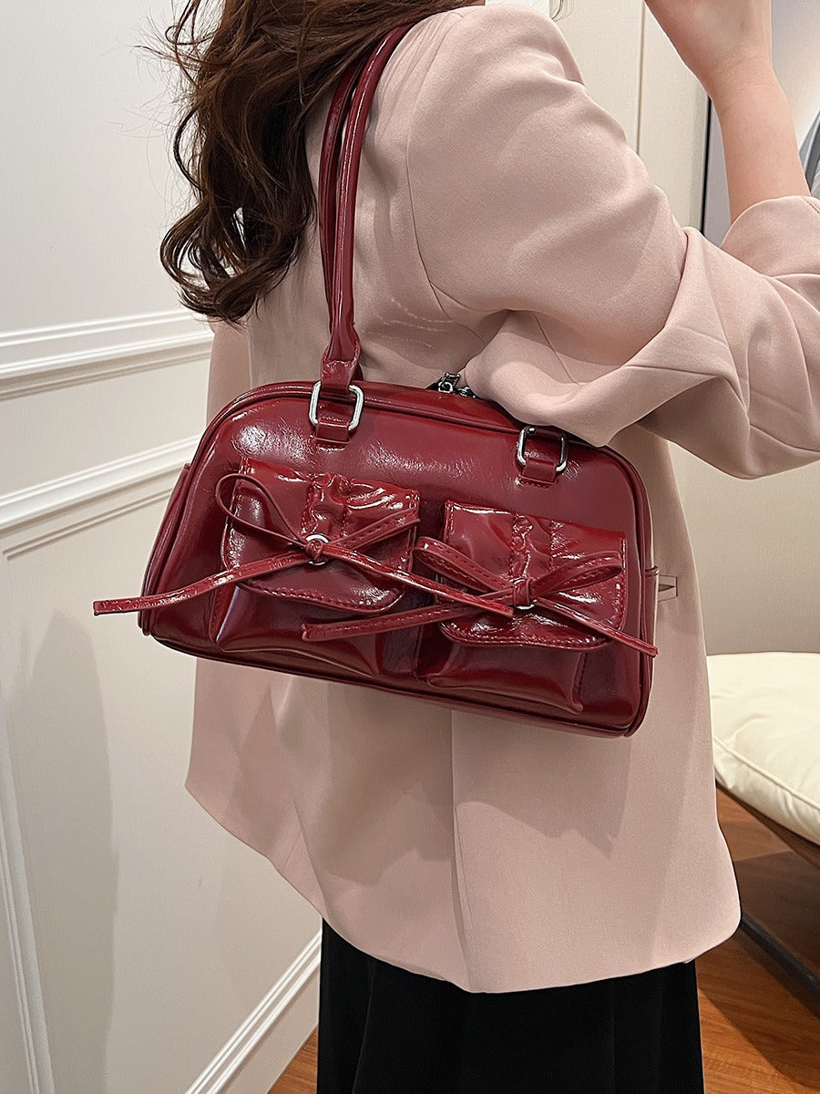 Fashion women's bag new style niche baguette bag handbag shoulder messenger bag bow hot girl armpit bag eprolo
